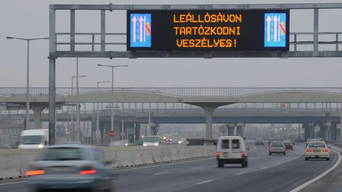 Waiting safely behind the barrier on the M3 motorway